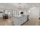 Open concept kitchen with island and dining area view at 168 Begonia St, Angier, NC 27501