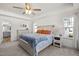 Main bedroom with ensuite bathroom access and a comfortable bed at 168 Begonia St, Angier, NC 27501