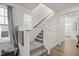 Modern carpeted staircase leading to the upper level of the home at 168 Begonia St, Angier, NC 27501