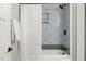 Close-up of renovated bath with patterned tile and modern black fixtures at 2207 Edwin Ave, Durham, NC 27705
