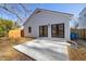 View of rear house exterior with patio and doors at 2207 Edwin Ave, Durham, NC 27705
