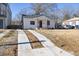 Front view of house with double driveway at 2207 Edwin Ave, Durham, NC 27705