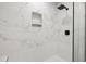 Walk-in shower with marble tile and built-in niche at 2207 Edwin Ave, Durham, NC 27705