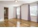 Bright and airy bedroom with hardwood floors, large windows, and neutral tones for a calming ambiance at 505 Annandale Dr, Cary, NC 27511