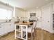 Kitchen featuring white cabinets, granite countertops, and stainless steel appliances at 505 Annandale Dr, Cary, NC 27511