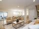 Open concept living room flows into the dining area and kitchen, providing ample space for entertaining at 505 Annandale Dr, Cary, NC 27511