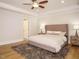 The main bedroom features a tray ceiling, hardwood floors, natural light, and a neutral color palette at 505 Annandale Dr, Cary, NC 27511