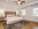 The main bedroom features a tray ceiling, hardwood floors, natural light, and a neutral color palette at 505 Annandale Dr, Cary, NC 27511