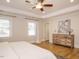The main bedroom features a tray ceiling, hardwood floors, natural light, and a neutral color palette at 505 Annandale Dr, Cary, NC 27511