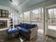 Bright and airy sunroom with comfortable seating and natural light at 505 Annandale Dr, Cary, NC 27511