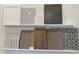 Image showing a variety of flooring, cabinetry and tile samples at 517 Marthas View Way, Wake Forest, NC 27587