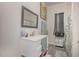 Clean bathroom with white vanity and shower at 607 Young St, Henderson, NC 27536
