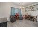 Bright dining area with a table, chairs, and decorative wall art at 607 Young St, Henderson, NC 27536