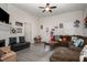 Spacious living room with sectional sofa, coffee table, and fireplace at 607 Young St, Henderson, NC 27536