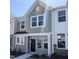Charming townhome showcasing modern architectural details and a welcoming entrance at 6332 Granite Quarry Dr, Raleigh, NC 27610