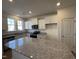 Well-equipped kitchen with stainless steel appliances, white cabinets, and granite counters at 6332 Granite Quarry Dr, Raleigh, NC 27610