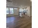 Open-concept living space showcasing hardwood floors, recessed lights, and a modern kitchen at 6332 Granite Quarry Dr, Raleigh, NC 27610