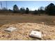 Image of vacant lot with utility access covers at 6545 Old Jefferson Davis Hwy, Cameron, NC 28326