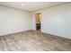 Bright bedroom with wood-look flooring and access to bathroom at 6567 Old Jefferson Davis Hwy, Cameron, NC 28326