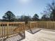 New home features a wooden deck overlooking the backyard at 6567 Old Jefferson Davis Hwy, Cameron, NC 28326