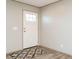 Simple entryway with a white door and patterned rug at 6567 Old Jefferson Davis Hwy, Cameron, NC 28326