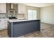 Modern kitchen with stainless steel appliances and large island at 6567 Old Jefferson Davis Hwy, Cameron, NC 28326
