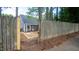Backyard with wooden fence and gate at 105 Tracey Creek Ct Ct, Apex, NC 27502