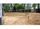 Landscaped backyard with retaining wall and steps at 105 Tracey Creek Ct Ct, Apex, NC 27502