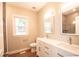 Modern bathroom with double vanity, shower, and tile flooring at 105 Tracey Creek Ct Ct, Apex, NC 27502