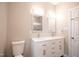 Double vanity bathroom with a modern design and updated fixtures at 105 Tracey Creek Ct Ct, Apex, NC 27502