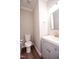 Small half bathroom with vanity and toilet at 105 Tracey Creek Ct Ct, Apex, NC 27502