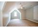 Bright bedroom featuring a window and ceiling fan at 105 Tracey Creek Ct Ct, Apex, NC 27502