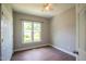 Spacious bedroom with wood flooring and ceiling fan at 105 Tracey Creek Ct Ct, Apex, NC 27502