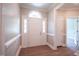 Front entry with white door and arched window at 105 Tracey Creek Ct Ct, Apex, NC 27502