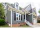 Gray house with white columns and dark shutters at 105 Tracey Creek Ct Ct, Apex, NC 27502