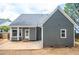 Gray house exterior with a patio and backyard at 105 Tracey Creek Ct Ct, Apex, NC 27502