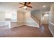 Open concept living room with kitchen island at 105 Tracey Creek Ct Ct, Apex, NC 27502