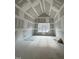 Spacious bedroom with vaulted ceiling and a large window at 1401 Cottondale Ln, Wake Forest, NC 27587
