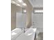 Bathroom with double vanity, tub, and updated fixtures at 1813 Ferrell Meadows Dr, Zebulon, NC 27597