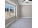 Bright bedroom featuring a large window and neutral color palette at 1813 Ferrell Meadows Dr, Zebulon, NC 27597