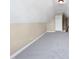 Spacious bonus room with carpeted floors and a door at 1813 Ferrell Meadows Dr, Zebulon, NC 27597