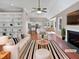 Virtually staged living room with fireplace and built-in shelves at 1813 Ferrell Meadows Dr, Zebulon, NC 27597