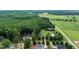 Aerial view of new construction home on large private lot surrounded by nature at 20 Tamaran Ct, Spring Hope, NC 27882