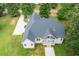 Aerial view of new construction home with large private back yard surrounded by mature trees at 20 Tamaran Ct, Spring Hope, NC 27882