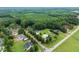 Aerial view of neighborhood featuring mature trees, well-kept lawns, and a mix of architectural styles at 20 Tamaran Ct, Spring Hope, NC 27882