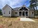 Backyard with concrete patio and a covered patio at 20 Tamaran Ct, Spring Hope, NC 27882