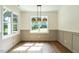 Dining room with large windows, natural light, and neutral decor at 20 Tamaran Ct, Spring Hope, NC 27882