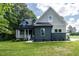 Attractive home with a mix of siding styles, well-maintained landscaping and a lush lawn at 20 Tamaran Ct, Spring Hope, NC 27882