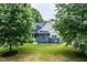 Charming two-story house featuring a cozy front porch and well-maintained lawn at 20 Tamaran Ct, Spring Hope, NC 27882