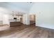 Open concept kitchen with white cabinetry, granite countertops, and stainless steel appliances at 20 Tamaran Ct, Spring Hope, NC 27882